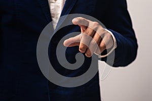 Businessman hand pointing or touching empty virtual screen
