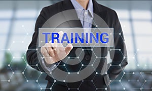 Businessman hand pressing button training.