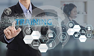 Businessman hand pressing button Training.