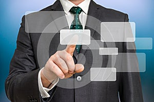 Businessman hand pressing modern touch screen button