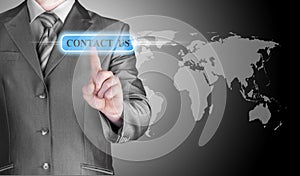 Businessman hand pushing contact us button