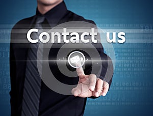 Businessman hand pushing contact us button on a touch screen interface