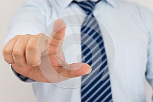 Businessman hand pushing screen