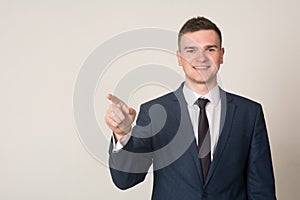 Businessman hand pushing screen on light background
