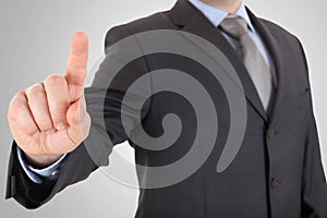 Businessman hand pushing screen