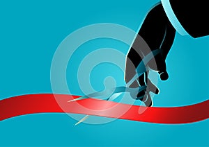 Businessman hand with scissors cutting red ribbon