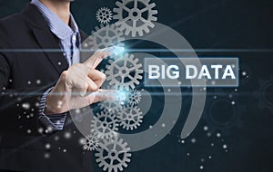 Businessman hand select wording big data.