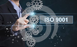 Businessman hand select wording iso 9001.