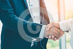 Businessman hand shake after the new project meeting. Two businesman hand shake as business agreement