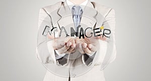 Businessman hand showing design graphic word MANAGER