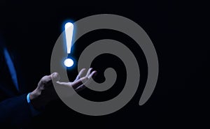 businessman hand showing exclamation point business development ideas Warning of errors, dangers, alerts, maintenance, And finding