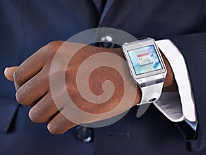 Businessman, hand and smart watch on wrist for digital agenda, online schedule and high tech for job. Black man, arm and