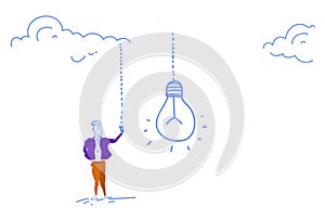 Businessman hand switching light bulb new creative idea startup project innovation concept horizontal