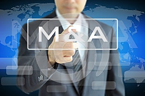 Businessman hand touching M & A on virtual screen