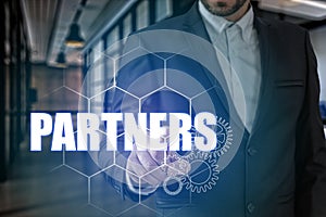 Businessman hand touching PARTNERS point, network connection