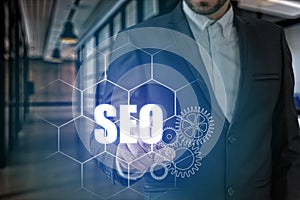 Businessman hand touching SEO point, network connection