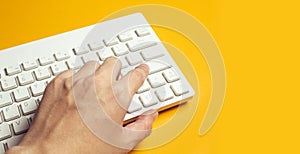 Businessman hand on typing keyboard computer, screwdriver in top view flat lay workspace table, digital data security privacy netw