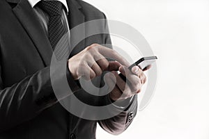 Businessman hand use smart phone.
