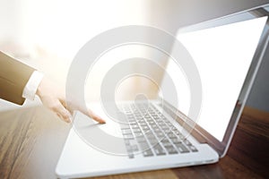 Businessman hand using laptop