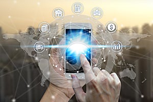 Businessman hand using smart phone the Network connection technology