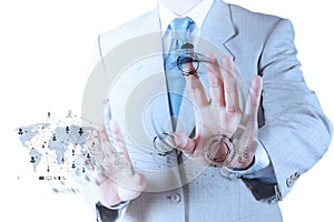 Businessman hand working with a Cloud Computing diagram