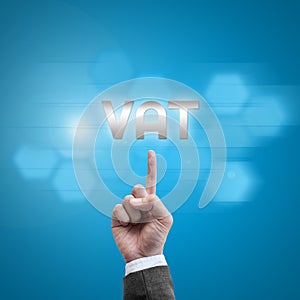 Businessman hand working with modern computer interface as VAT photo