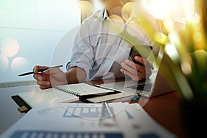 Businessman hand working with new modern computer and business