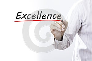 Businessman hand writing Excellence with marker, Business concept