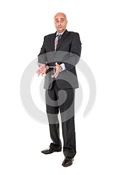 Businessman in handcuffs