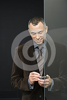 Businessman with handheld computer