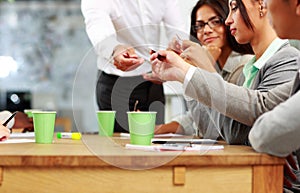 Businessman handing out a business card