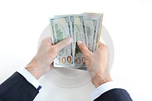 Businessman hands counting money,US dollar (USD) bills photo