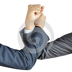 Businessman hands engage in arm wrestling