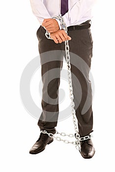 Businessman hands and legs chain, job slave symbol photo