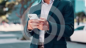 Businessman, hands and typing on smartphone for networking in downtown New York. Closeup, entrepreneur and texting on