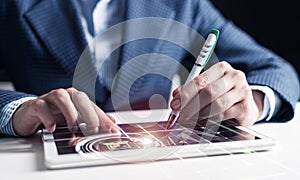 Businessman hands using tablet computer