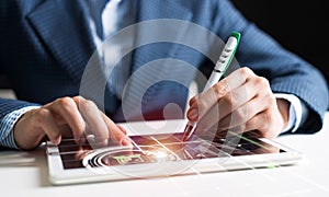 Businessman hands using tablet computer