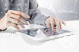 Businessman hands using tablet computer