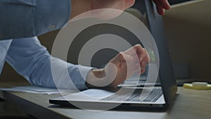 Businessman hands using touchpad on laptop. Employee typing on computer keyboard