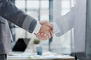 Businessman handshake for teamwork of business merger and acquisition