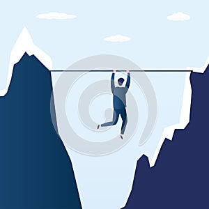 Businessman hanging over a cliff,business problem or crisis concept