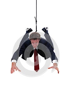 Businessman hanging by a rope for product placemen