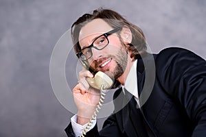 Businessman has a good phone call