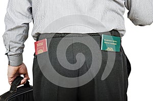 Businessman has Russian and Tonga passports in his rear pockets