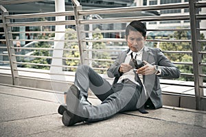 Businessman have headache and stressed, unemployed concept, Bankrupt concept, Salaryman problem Concept photo