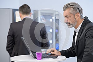 Businessman having coffee break
