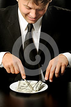 The businessman having dinner dollars