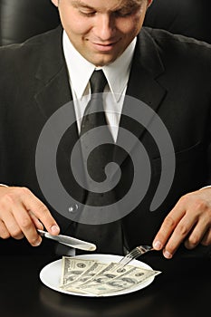 The businessman having dinner dollars