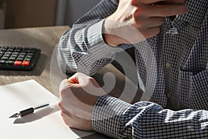 Businessman having a discussion. Colleagues arguing, discussing business failure, partners disputing at work sits at a table