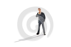 Businessman having doubts standing pondering